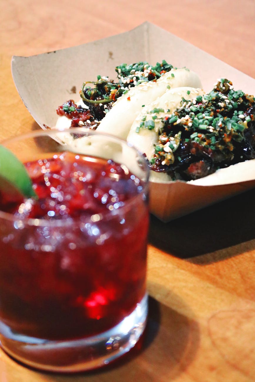 Manipulation in Society: The Unethical Practices of Advertising, Marketing, and Corporate Greed Counterbalanced by Vedic Wisdom 5 Alcoholic Game, clear drinking glass with red liquid